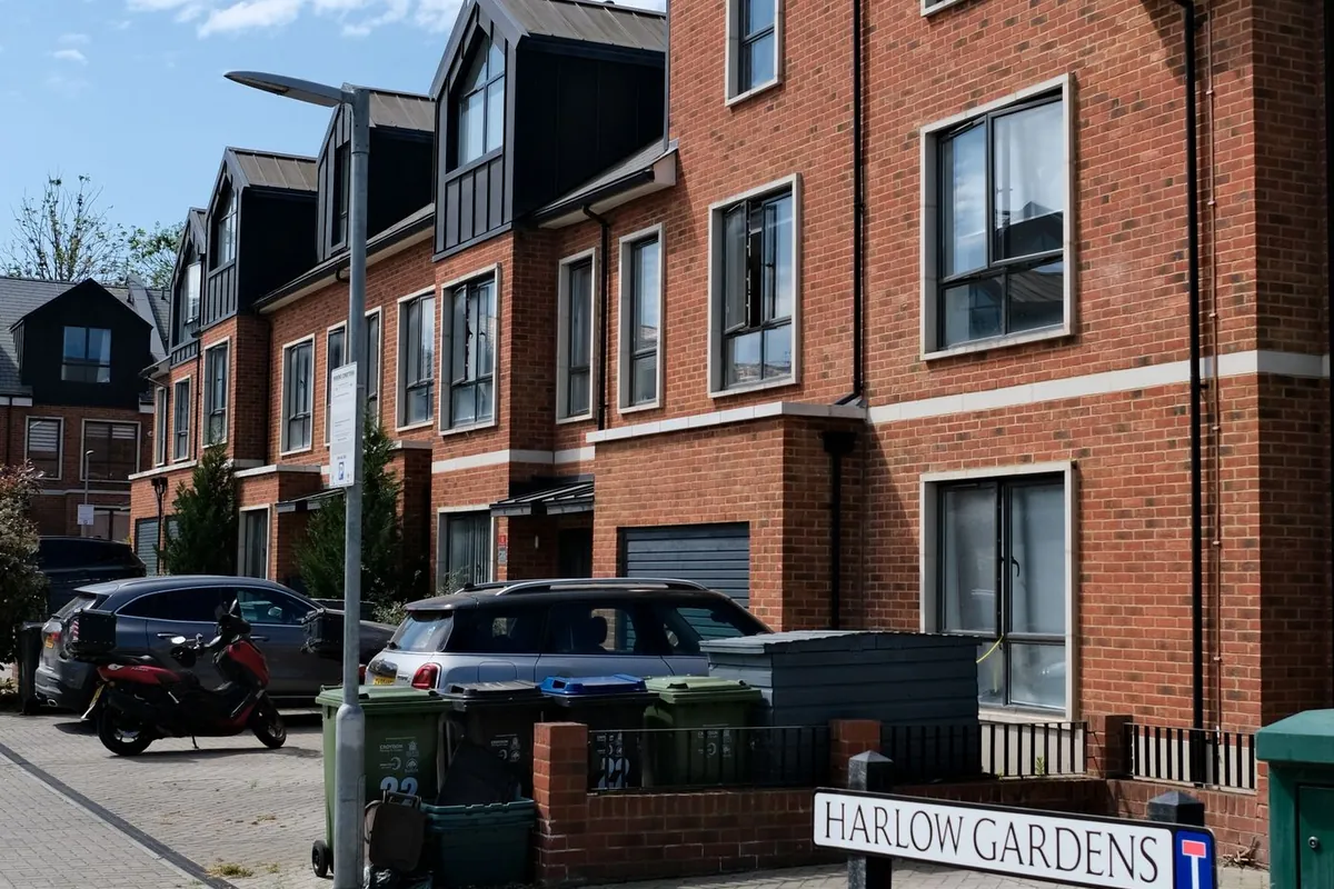 Modern new build brick houses on a UK residential street