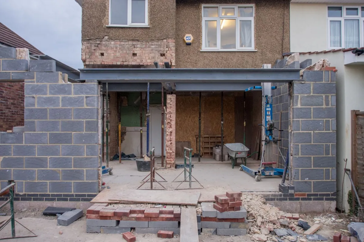 A single storey rear extension under construction on a UK house
